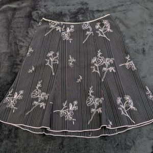 Black skirt with lace trim & embroidered flowers